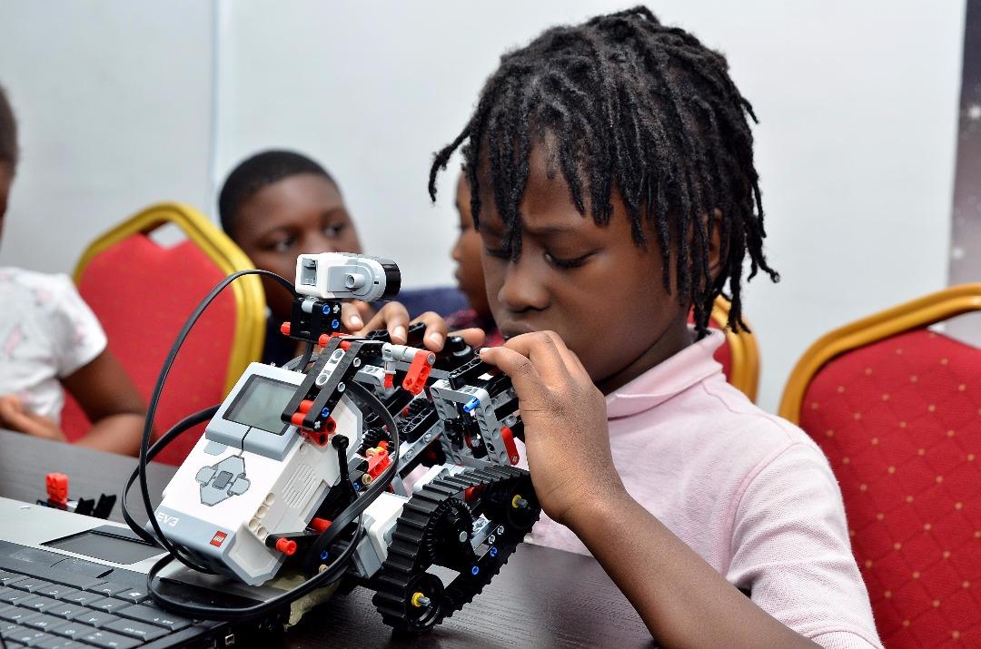 Young student working on a robotics project